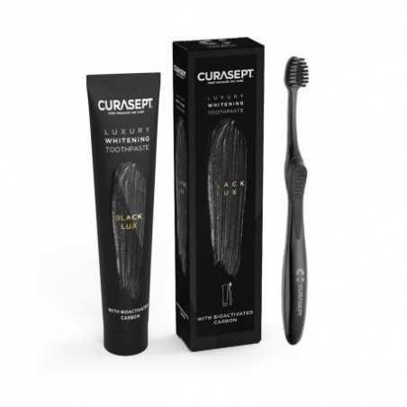 Curasept Black Luxury Whitening Toothpaste dentifricio sbiancante 75 ml + spazzolino Curasept Black Luxury Whitening Toothpaste dentifricio sbiancante 75 ml + spazzolino